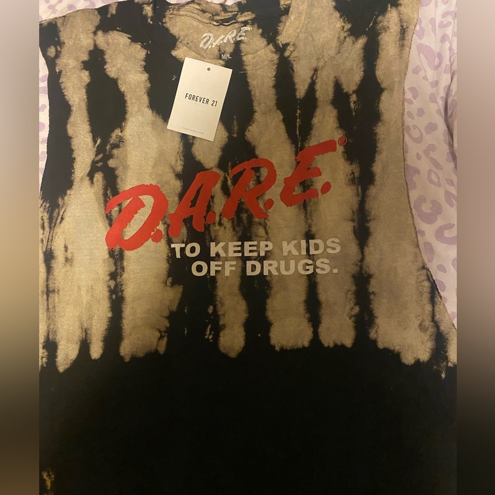 sleeveless D.A.R.E shirt from forever 21. Never been worn and still has tag.